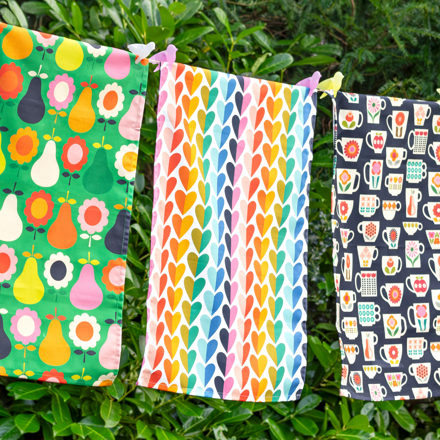 Kitchentins - Kate Rhees Rainbow Hearts design tea towel