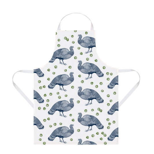 Kitchentins - Thornback & Peel apron with Turkey & Sprout pattern on a white background