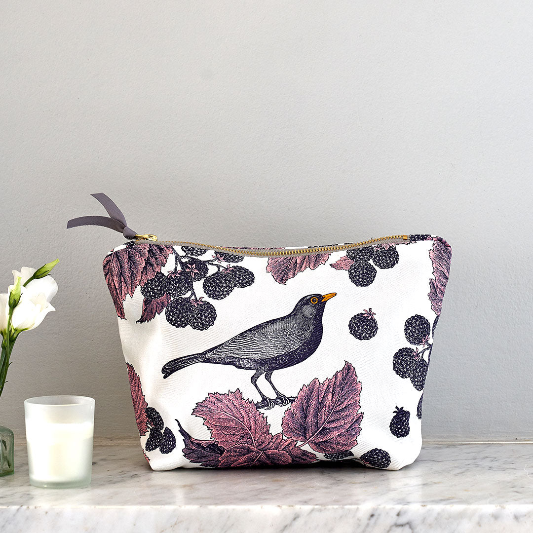 Kitchentins - Thornback and Peel large cosmetic bag printed in purple tones in the blackbird and bramble design.