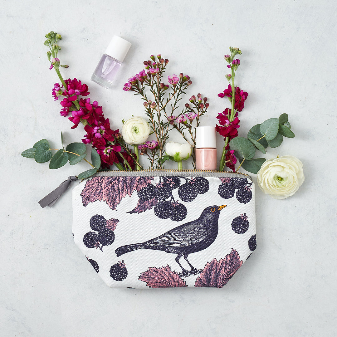 Kitchentins - Thornback and Peel small cosmetic bag printed in purple tones in the blackbird and bramble design.