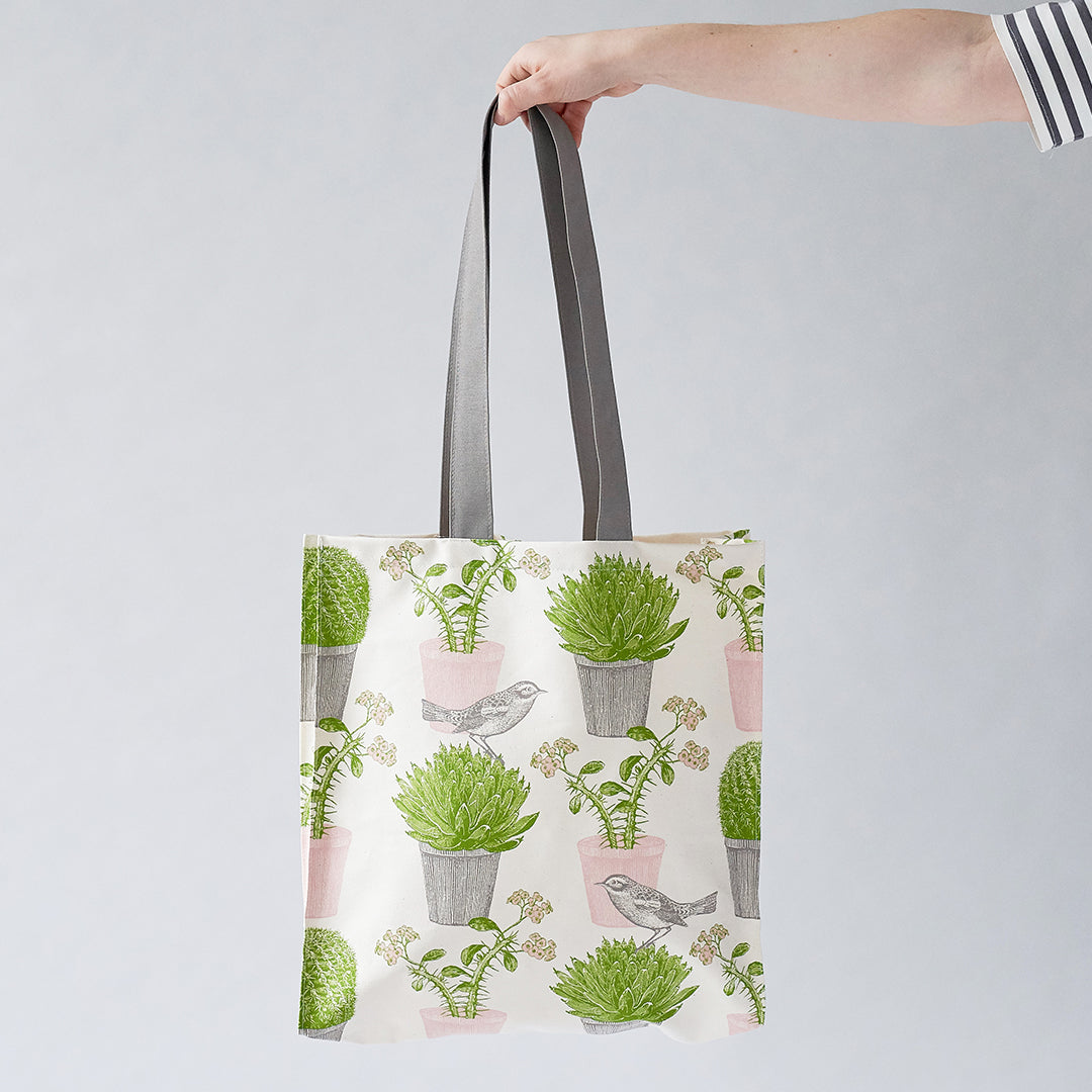 kitchentins - Thornback and Peel Cotton tote bags printed with pink and green succulents with a little bird hopping around