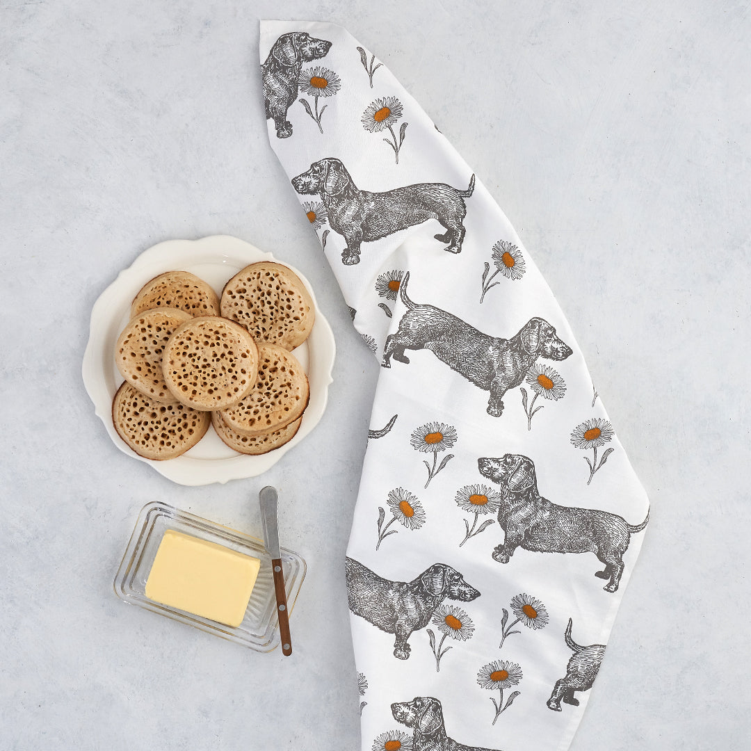 kitchentins - Thornback & Peel cotton tea towel printed with sweet daschunds and delicate daisies.