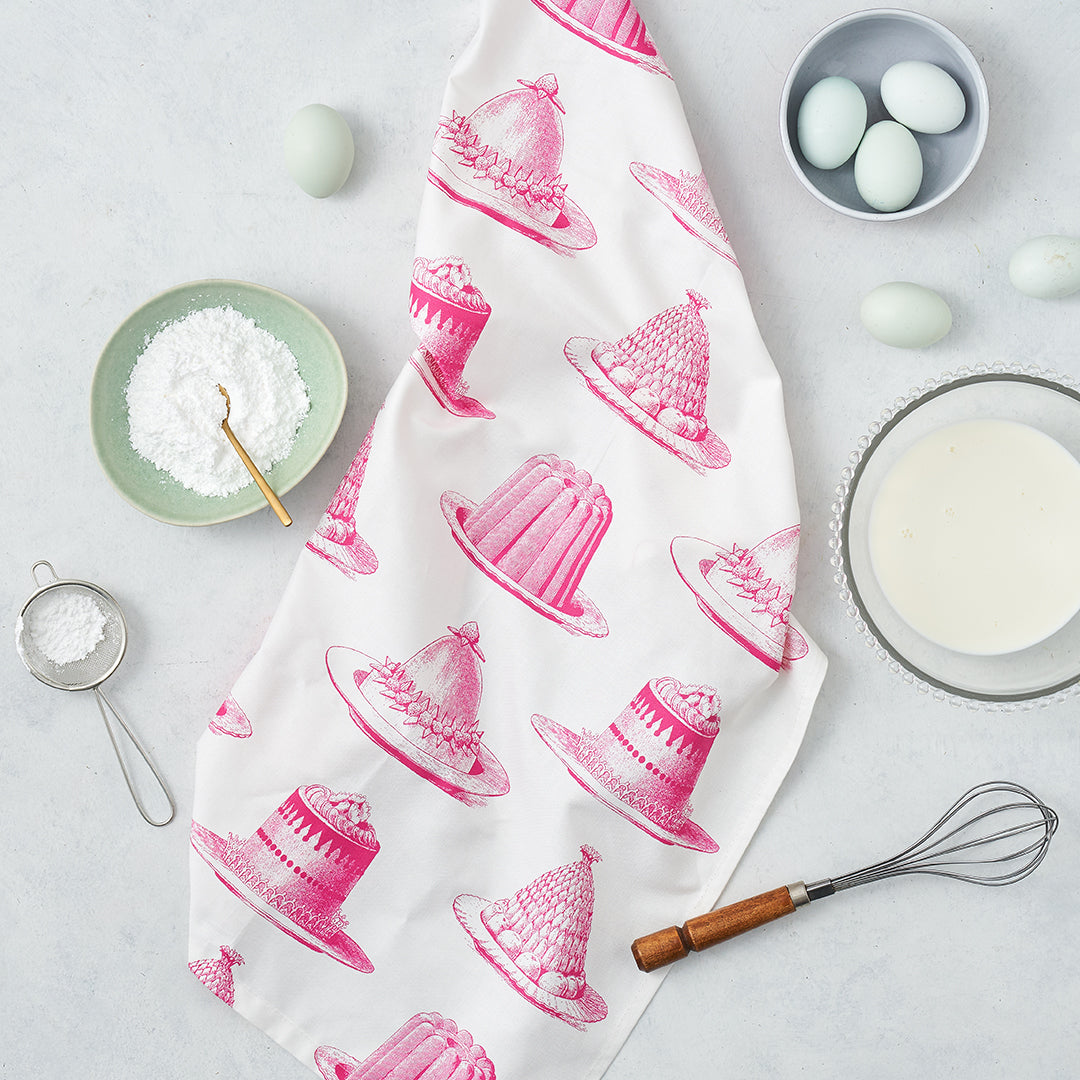 Kitchentins - Thornback & Peel cotton tea towel printed with raspberry pink jellies and cakes