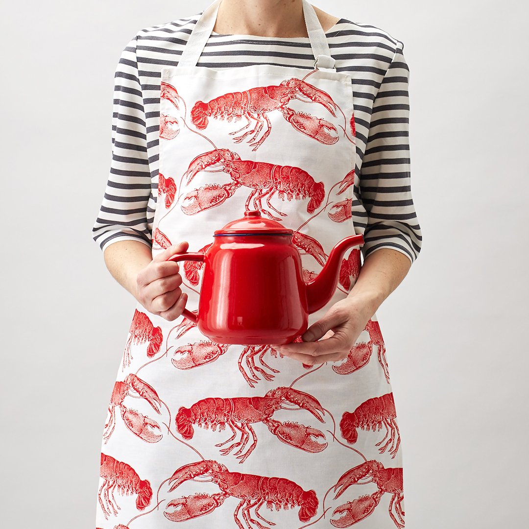 kitchentins - Thornback & Peel cotton apron printed with coral red lobster design with adjustable neck strap.