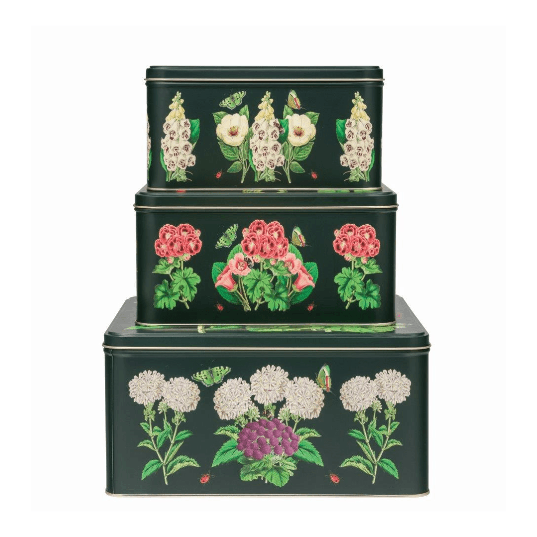 kitchentins - Madame Treacle set of 3 cake tins with floral design on a dark green background.