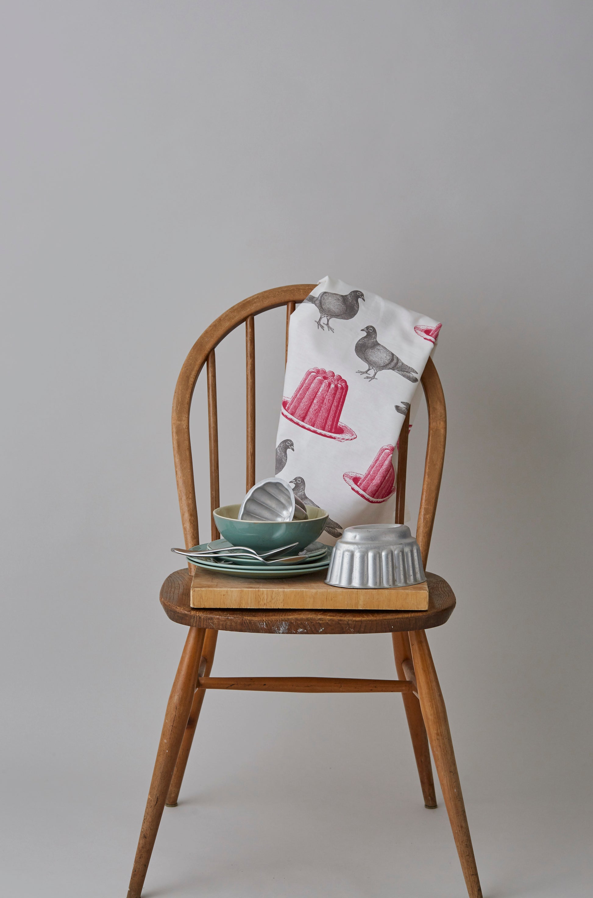 Kitchentins - Thornback & Peel cotton tea towel printed with raspberry pink jellies and grey pigeons.