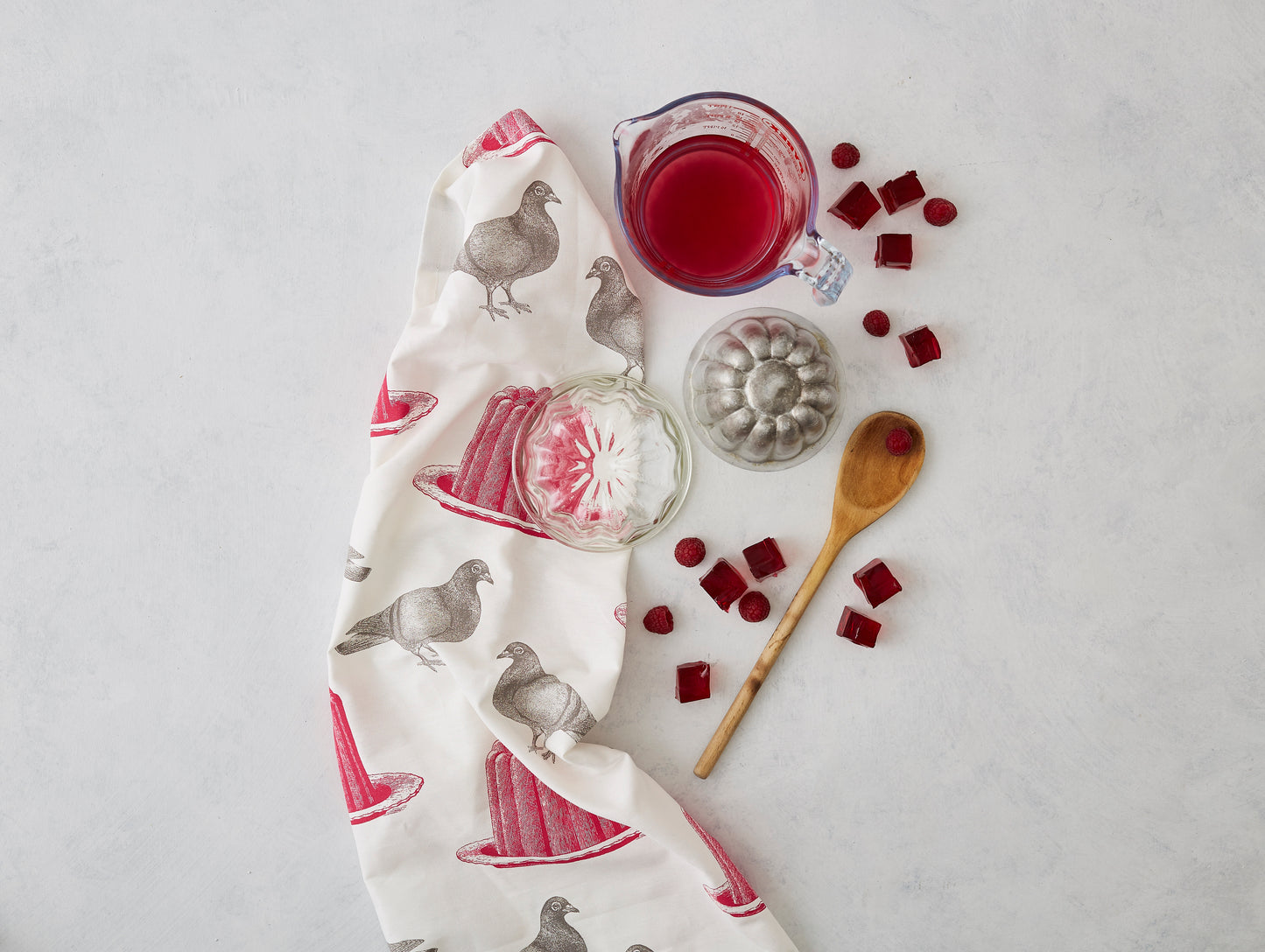 Kitchentins - Thornback & Peel cotton tea towel printed with raspberry pink jellies and grey pigeons.